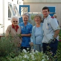 Patients and staff in the garden